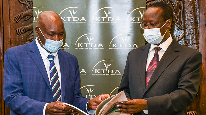 KTDA Holdings Chairman, Peter Kanyago (left) with KTDA Holdings Group CEO, Lerionka Tiampati at the company's AGM held on Friday, Dec 18, 2020 in Nairobi. PHOTO/KTDA