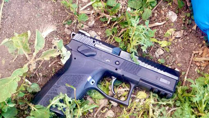 Pistol recovered from the scene. PHOTO/COURTESY