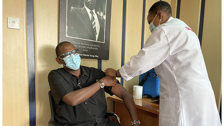 Nzioka Waita getting vaccinated. PHOTO/COURTESY 