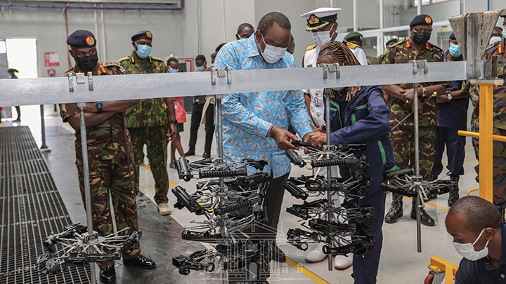 Uhuru Kenyatta at the arms factory. PHOTO/PSCU