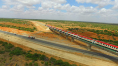 Passenger train crossing Mombasa Road over Taru Bridge. PHOTO/COURTESY