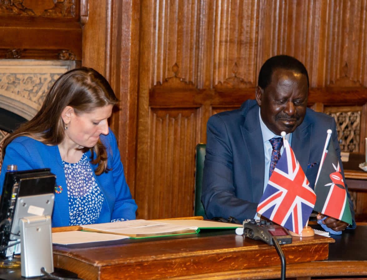 Ms. Theo Clarke and Raila Odinga. PHOTO/COURTESY