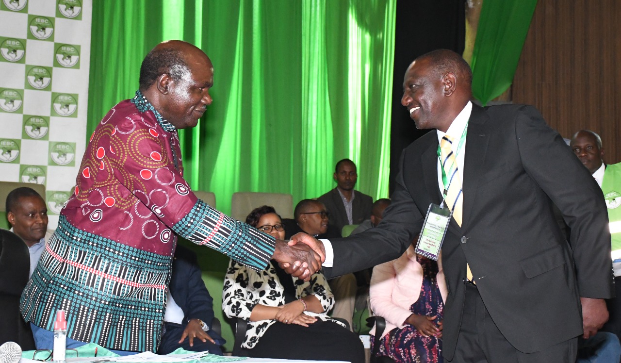 Wafula Chebukati and William Ruto. PHOTO/IEBC