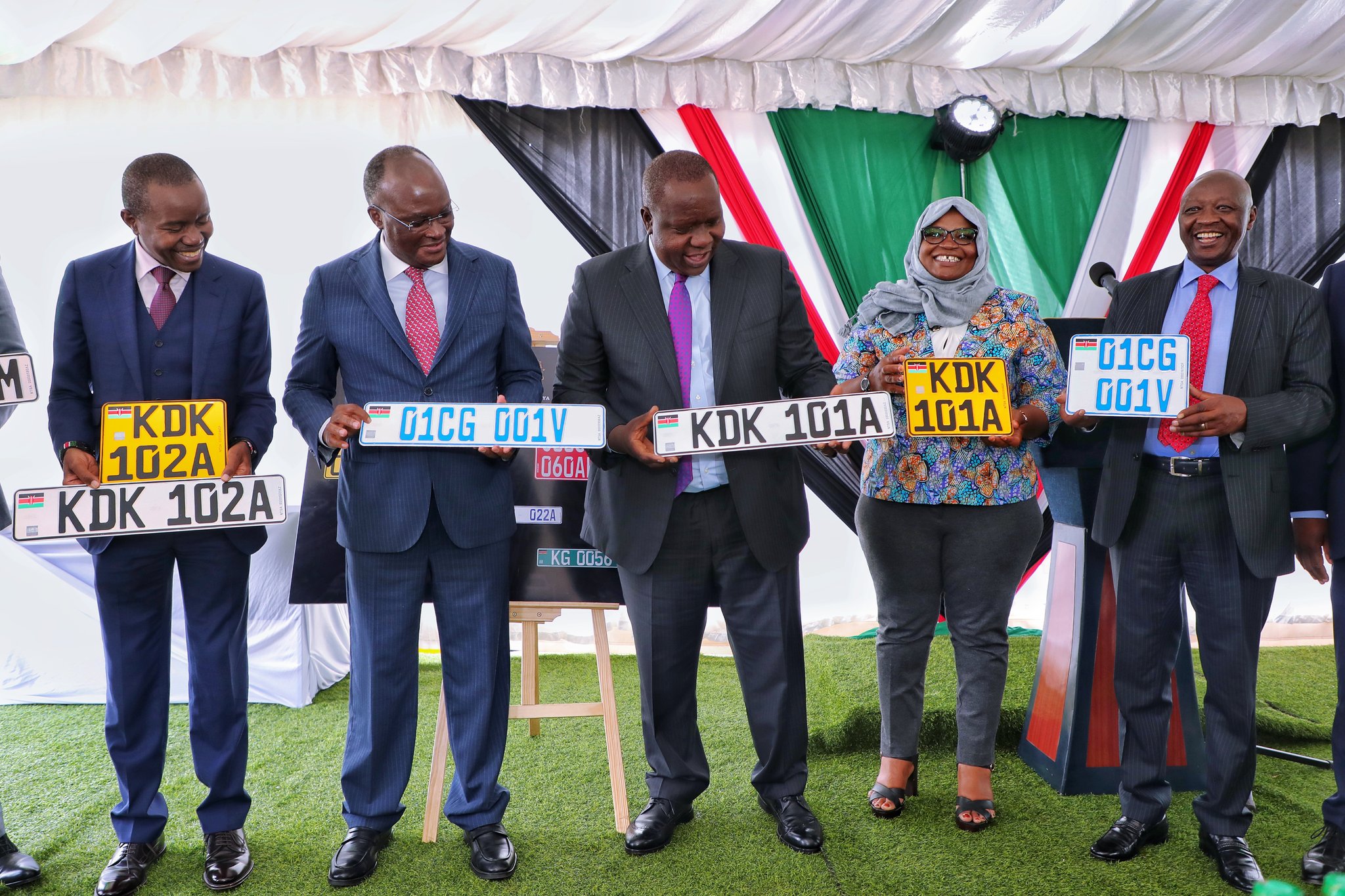 Joe Mucheru, James Macharia and Fred Matiang'i during commissioning new generation number plates. PHOTO/TWITTER