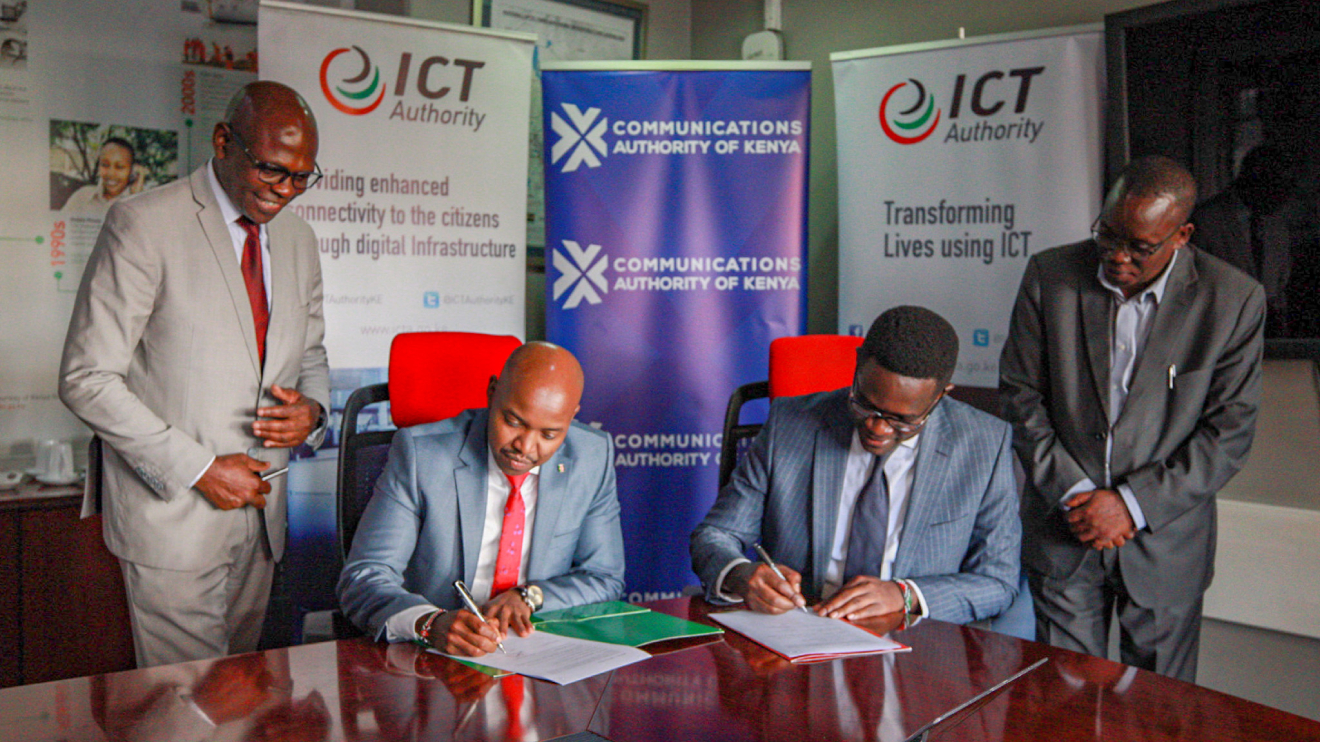 ICT Authority CEO Stanley Kamangunya and Communications Authority CEO Ezra Chiloba signing the agreement. PHOTO/COURTESY