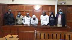 Suspects involved in the disappearance of subsidised fertiliser before Milimani Law Courts. PHOTO/DCI