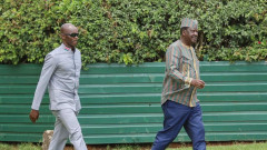 Maurice Ogeta walking behind Raila Odinga. PHOTO/COURTESY