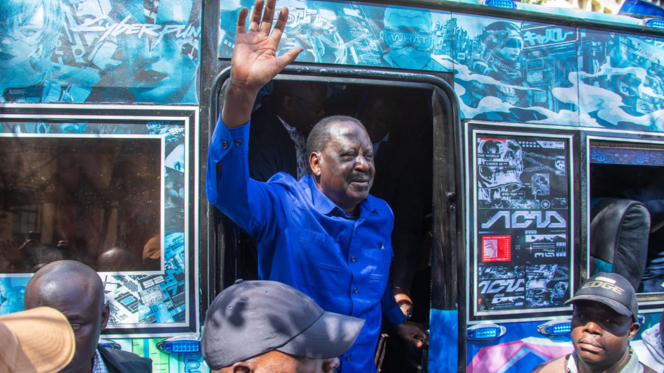 Raila Odinga disembarking a matatu he boarded to town at Ambassador bus station. PHOTO/COURTESY