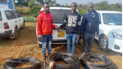 Suspects arrested with vandalised equipment. PHOTO/COURTESY