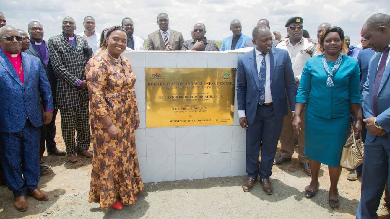 Pastor Dorcas Rigathi (left) unveiling the plaque for the Rehabilitation and Wellness Centre in Rumuruti Ward, Laikipia County. PHOTO/COURTESY