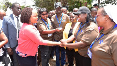 Anne Waiguru exchanging pleasantries with CHPs. PHOTO/COURTESY