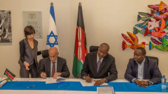 Mama Doing Good’s CEO, Dr. John Chumo, and Israel Ambassador to Kenya, Michael Lotem signing the MoU. PHOTO/COURTESY
