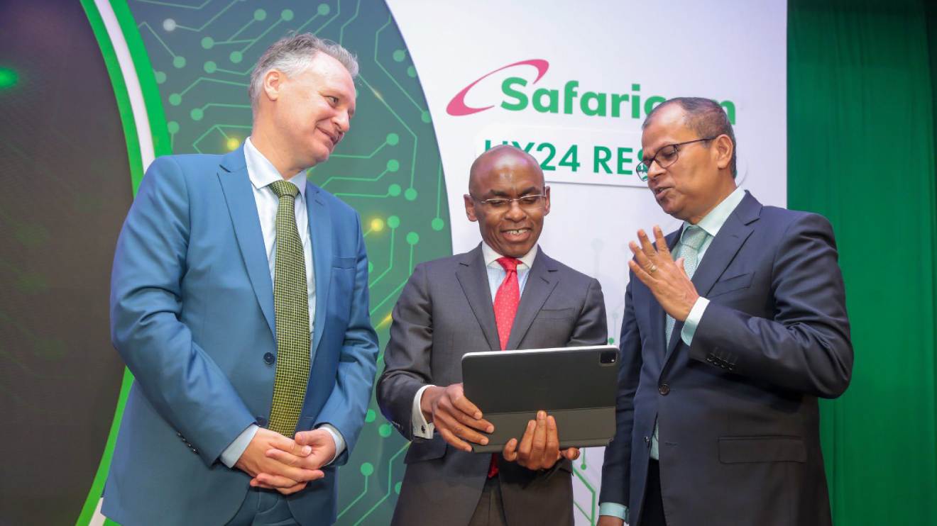 Safaricom Ethiopia CEO Wim Vanhelleputte, Safaricom CEO Peter Ndegwa and Safaricom CFO Dilip Pal. PHOTO/SAFARICOM