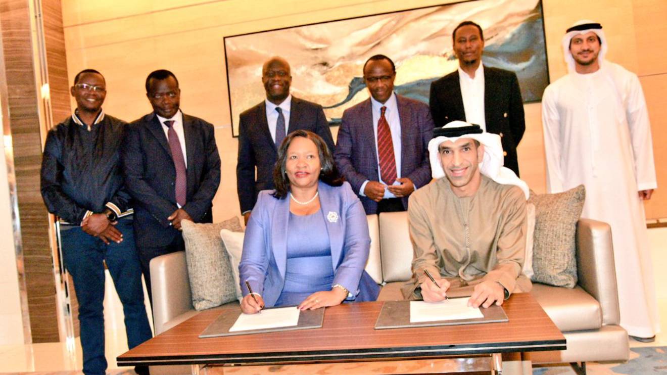 Rebecca Miano and Thani bin Ahmed Al Thani Al Zeyoudi signing the partnership. PHOTO/COURTESY