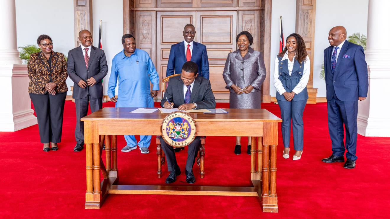 Alfred Mutua signing the gazette notice at State House. PHOTO/COURTESY