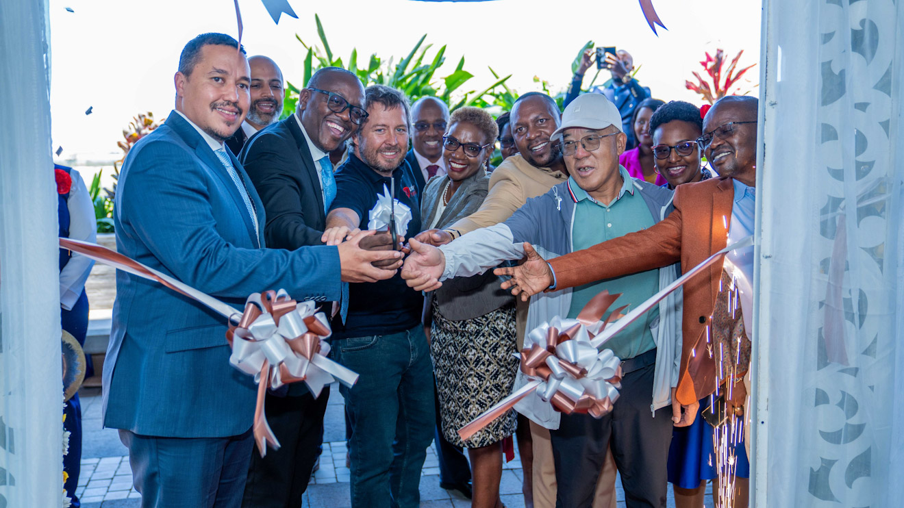 NCBA's Tim Armitage is joined by his colleagues and other stakeholders in officially opening the NCBA Tati City Branch. PHOTO/COURTESY