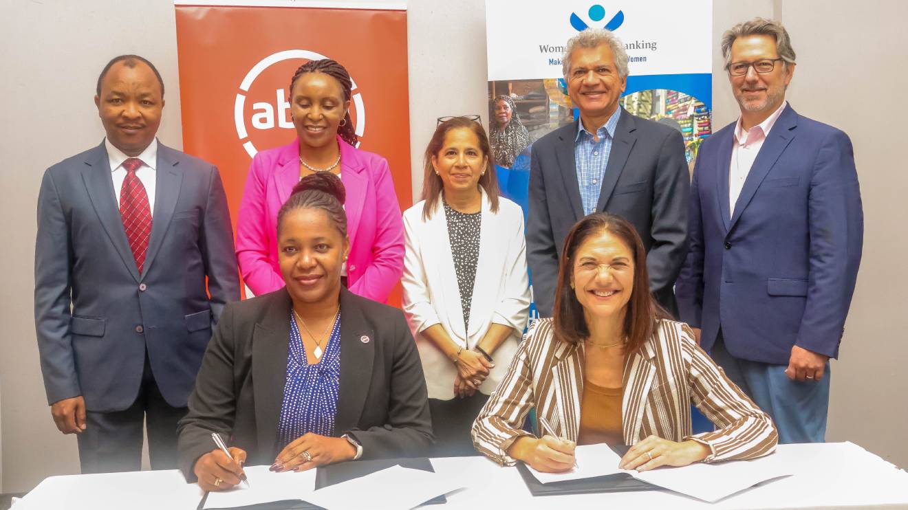 Elizabeth Wasunna and Mary Ellen Iskenderian (sitted) and other officials during the signing of the MoU. PHOTO/COURTESY