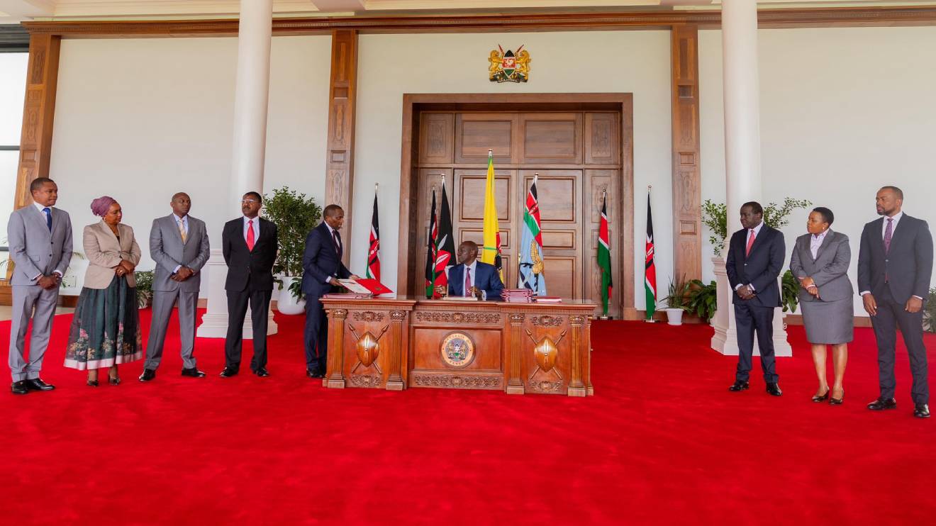 William Ruto accenting to the bills. PHOTO/COURTETSY