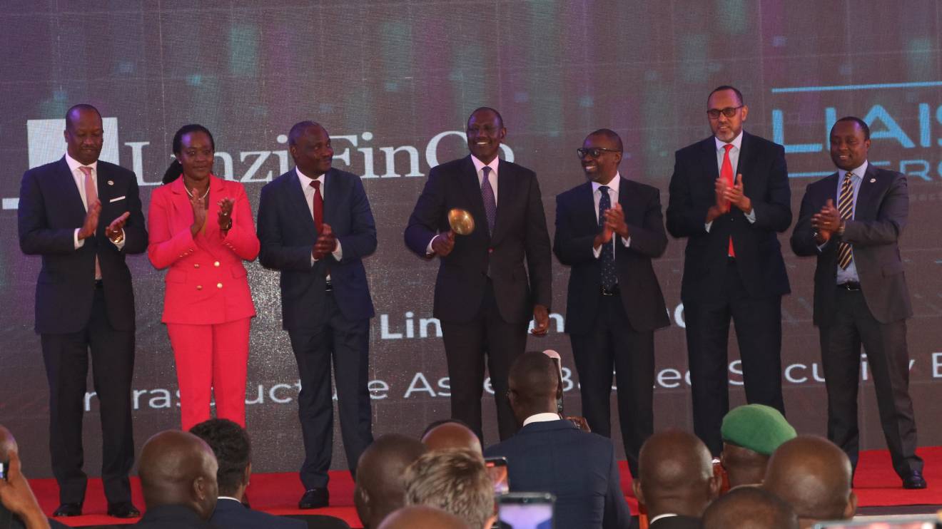 William Ruto ringing the bell to mark the listing of the Linzi 003 Infrastructure Asset-Backed Security. PHOTO/COURTESY