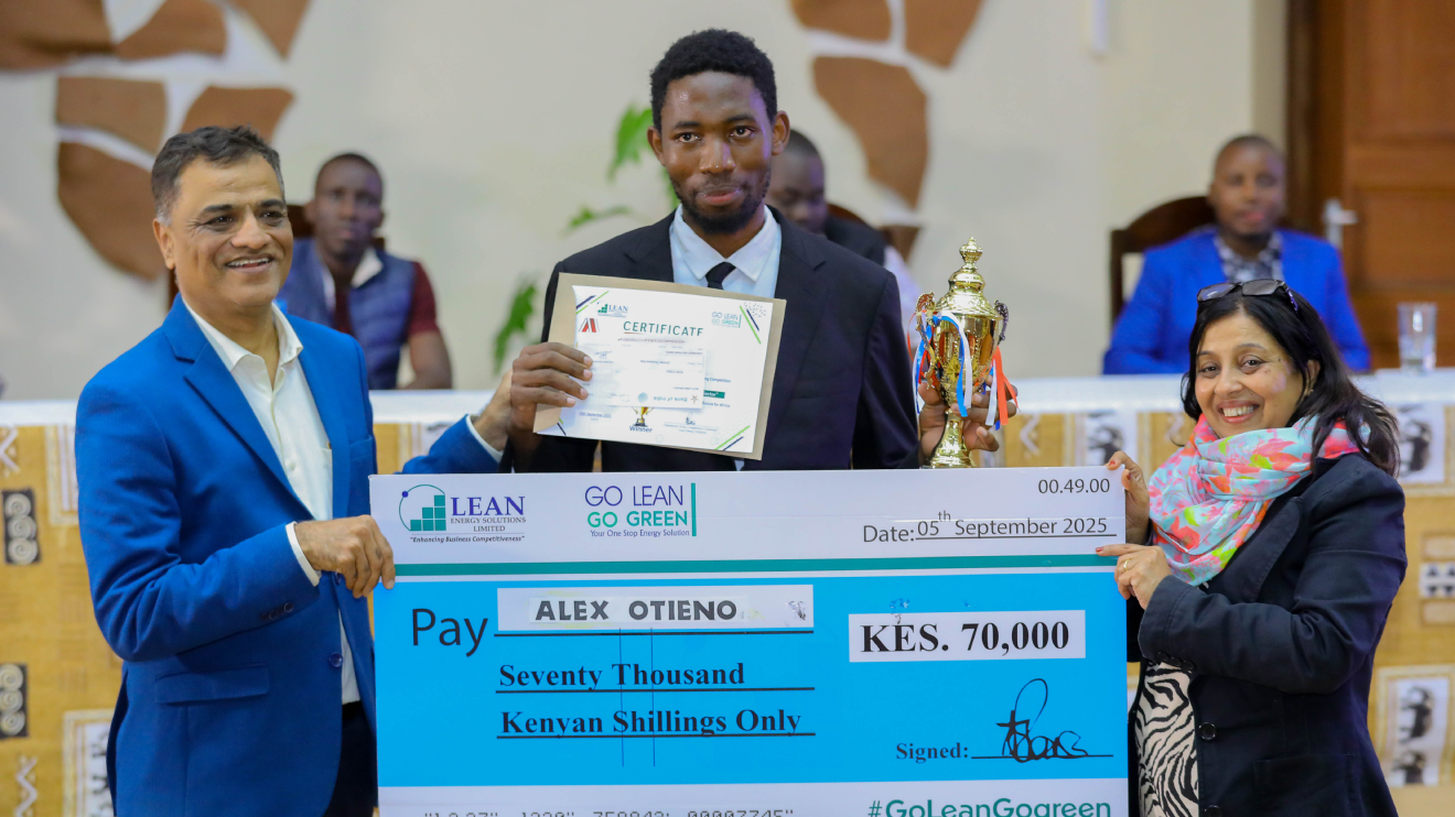 Lean Energy Solutions Managing Director, Dinesh Tembhekar (left), and Finance Director, Leena Tembhekar (right), present the winner’s cheque and trophy to Alex Otieno. PHOTO/COURTESY